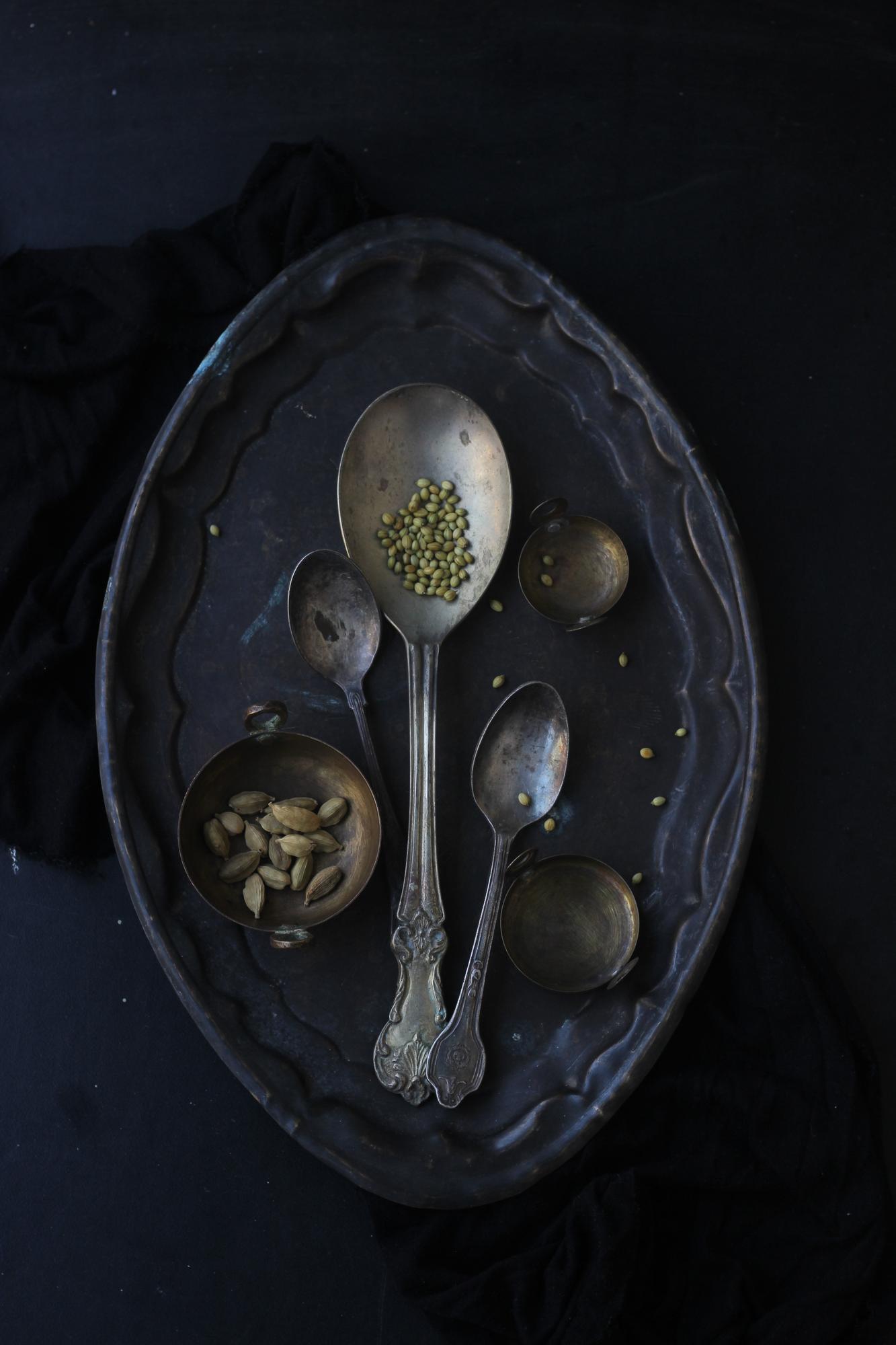 assorted plated courses on dark slate